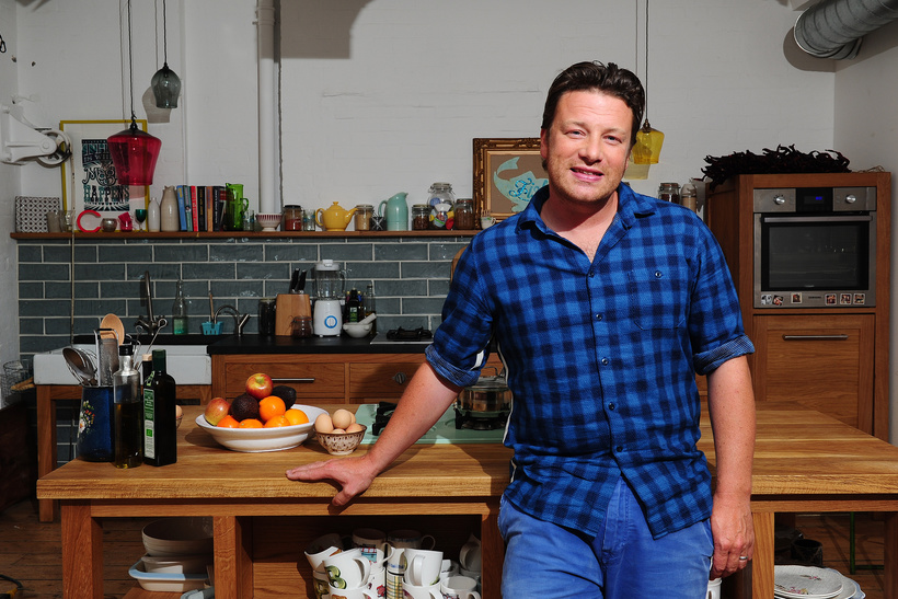 File photo dated 29/08/13 of chef Jamie Oliver in a kitchen in London, who is to lift the lid on his personal life and talk about the collapse of his restaurant chain in a new one-off documentary.
